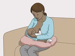 Stillen, Beispiel 1: Die Mutter sitzt und das Baby liegt auf ihrem Arm.